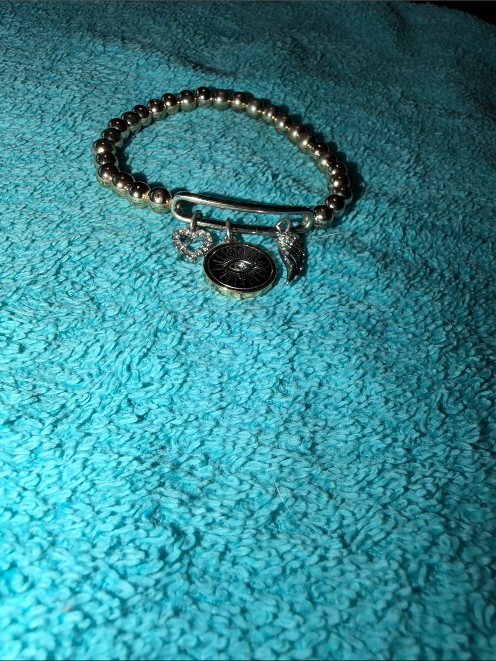 Gold-Tone Beaded Charm Bracelet with Heart, Wing and Eye Charms - Picture 3 of 3